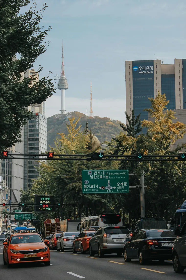 Cars parked beside a road in Seoul