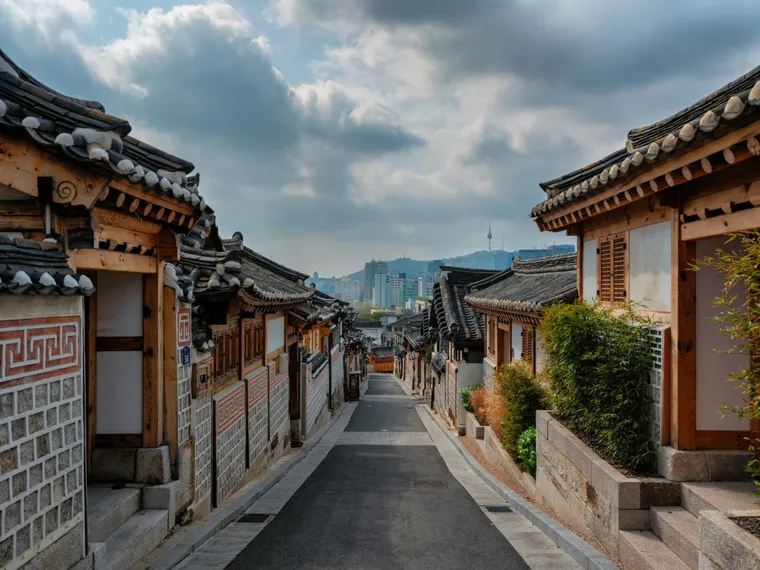 A street lined with traditional wooden buildings in Seoul